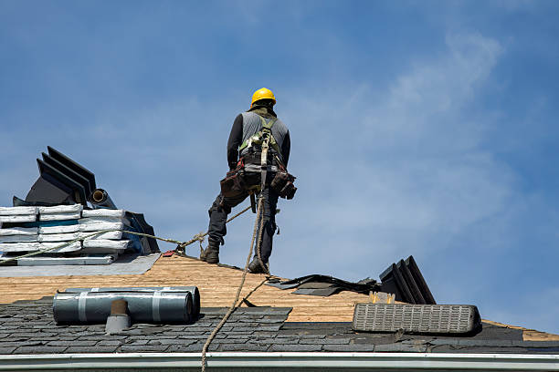 Professional Roof Replacement technician working in Chichester, NY